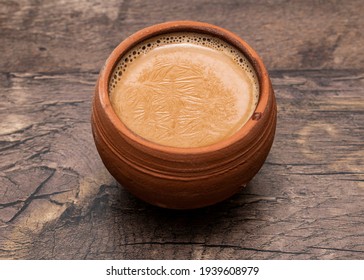 Kulhad Chai is a tea beverage made by boiling black tea in milk and water with a mixture of aromatic herbs and spices.