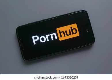 KULIM,MALAYSIA - APRIL 4TH,2020 : Top view of smartphone with a Pornhub logo.Pornhub is a pornographic video sharing and pornography website.