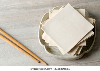 Kulit Pangsit (Wonton Wrappers) or Dumpling Skin, usually as a wrapper with minced meat in it. This food is usually an additional menu when ordering the boiled noodle menu, sometimes also as a snack.