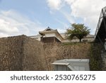 Kumamoto Castle (considered one of the three premier castles in Japan, along with Himeji Castle and Matsumoto Castle) is a hilltop Japanese castle dating back to 1467 in Kumamoto, Japan, Asia