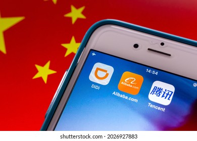 Kumamoto, JAPAN - Aug 10 2021 : Concept Image Of DiDi, Alibaba And Tencent Icons On IPhone On Chinese Flag.