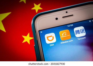 Kumamoto, JAPAN - Aug 10 2021 : Concept Image Of DiDi, Alibaba And Tencent Icons On IPhone On Chinese Flag.