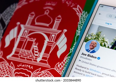 Kumamoto, JAPAN - Aug 26 2021 : Conceptual Image 46th US President Joe Biden Twitter Account On IPhone On Afghanistan Flag.