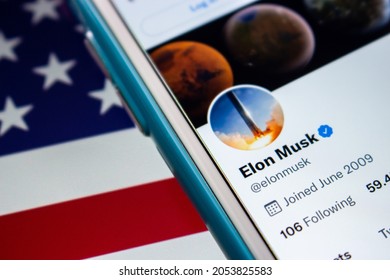 Kumamoto, JAPAN - Aug 26 2021 : Elon Musk Twitter Account On IPhone On The US Flag. He Is Known As Founder, CEO, And Chief Engineer At Aerospace Manufacturer, Space Transportation Corporation SpaceX