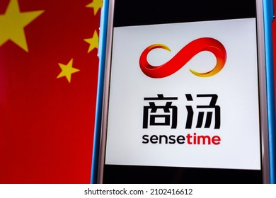 Kumamoto, JAPAN - Dec 14 2021 : The Logo Of SenseTime, A Hong Kong Based Leading Artificial Intelligence Software Company, On IPhone On Chinese Flag.