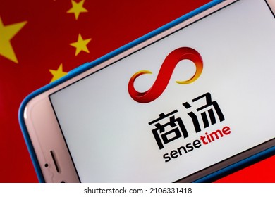 Kumamoto, JAPAN - Dec 14 2021 : The Logo Of SenseTime, A Hong Kong Based Leading Artificial Intelligence Software Company, On IPhone On Chinese Flag.