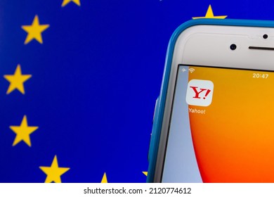 Kumamoto, JAPAN - Feb 2 2022 : Closeup Yahoo! Japan logo on the iPhone on EU flag. Yahoo Japan announced that Yahoo Japan website will be unavailable to most of Europe and it starts from April 2022