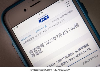 Kumamoto, JAPAN - Jul 15 2022 : “Information About Network Disruptions” In A Website Of KDDI On Phone In A Dark Mood. In Jul 2022, Japan's Mobile Carrier 