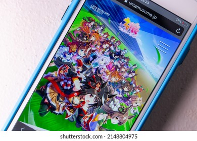 Kumamoto, JAPAN - Mar 23 2022 : The opening screen of an Uma Musume Pretty Derby app (Translation : Horse Girl Pretty Derby) on the iPhone. Uma Musume is a multimedia franchise by Cygames.