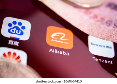 Kumamoto, Japan - Mar 5 2020 :
Close Up Of Alibaba Logo, Founded On 4 April 1999 In Hangzhou, Zhejiang, With Chinese Big Tech Company Logos (Baidu, Tencent And Huawei) & Money On An IPhone.