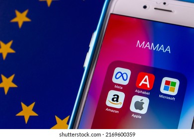 Kumamoto, JAPAN - May 11 2022 : MAMAA (GAFA Big Tech, Meta Platform Inc., Alphabet Inc., Microsoft, Amazon And Apple) On An IPhone On An Eu Flag Bg.