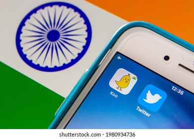 Kumamoto, JAPAN - May 13 2021 : Koo App, An Indian Microblogging Social Networking Service Based In Bengaluru, Karnataka, India, With Twitter App On IPhone On Indian Flag