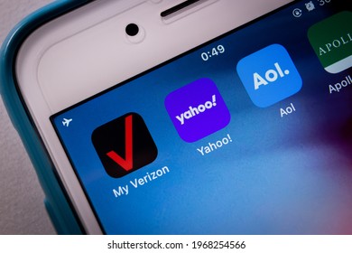 Kumamoto, JAPAN - May 4 2021 : Icons of Verizon, Yahoo!, Aol and Apollo Global Management on iPhone. Verizon announced that to sells own medias including Yahoo and AOL to Apollo Global in 2021