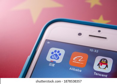 Kumamoto, JAPAN - Oct 2 2020 : Icons Of China’s Big Tech Giants (Baidu, Alibaba And Tencent) On IPhone With Chinese Flag.