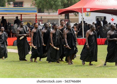 KUMASI, GHANA - JAN 16, 2017: Unidentified Ghanaian People In Black Clothes At The Memorial Ceremony Dedicated To The Queen Mother Of The Asante Kingdom