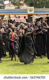 KUMASI, GHANA - JAN 16, 2017: Unidentified Ghanaian People In Black Clothes At The Memorial Ceremony Dedicated To The Queen Mother Of The Asante Kingdom