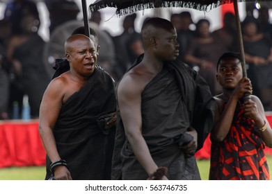 KUMASI, GHANA - JAN 16, 2017: Unidentified Ghanaian People In Black Clothes At The Memorial Ceremony Dedicated To The Queen Mother Of The Asante Kingdom