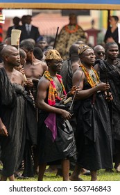 KUMASI, GHANA - JAN 16, 2017: Unidentified Ghanaian People In Black Clothes At The Memorial Ceremony Dedicated To The Queen Mother Of The Asante Kingdom