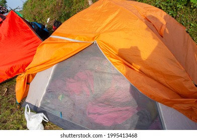 Kuningan, Indonesia - May 23, 2021 - Orange Tent Covered With Mosquito Net