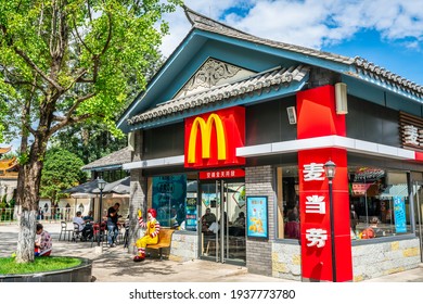 Kunming Yunnan China , 3 October 2020 : McDonalds Restaurant Entrance With Logo And Name In Chinese Characters In A Traditional Architecture Building In China