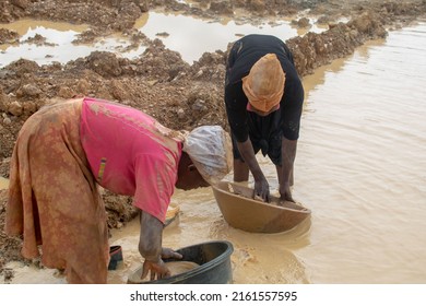 KUNSU, GHANA – May 22, 2022: Illegal Miners At Work In Ghana. Illegal Mining Site In Ghana. Galamsey