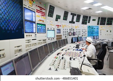 KURCHATOW, RUSSIA - JUNE 23, 2016: The operator monitors the readings of devices and work equipment. Central control unit of Kursk NPP.