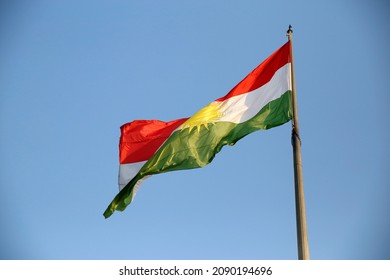 Kurdistan Flag and a blue sky