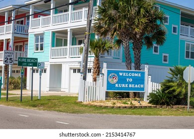 Kure Beach North Carolina United States May 5, 2022 A blue welcome sign that says, "Welcome to Kure Beach"