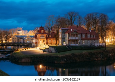 Kuressaare, Estonia. Old Wooden Mansion Ekesparre Boutique Hotel In Wooden Art Nouveau In Evening Blue Hour Night.