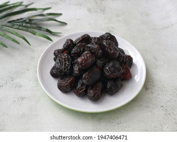 Kurma Ajwa or Ajwa dates is a kind of date palm from Timur Tengah which is usually eaten when breaking the fast in the month of Ramadhan. Selective focus.