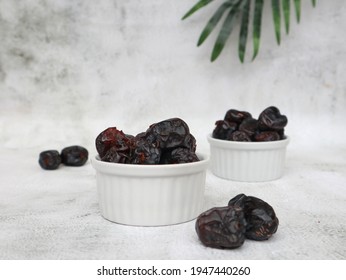 Kurma Ajwa or Ajwa dates is a kind of date palm .which is usually eaten when breaking the fast in the month of Ramadhan. Selective focus. 