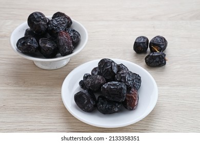 Kurma Ajwa, Ajwa Dates. Kurma Ajwa is one of the special fruit of Arabic. Served in small plate.
