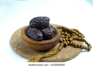 Kurma Ajwa, Ajwa Dates. Kurma Ajwa is one of the special fruit of Arabic. Served in wooden bowl, selective focus