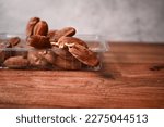kurma or dates druits isolated on wooden background selective focus