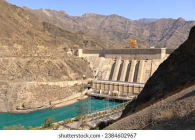 Kurpsai Hydro station. Lower Naryn River Canyon near Toktogul in Kyrgyzstan. a Hydroelectric dam in central asia - Powered by Shutterstock