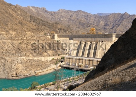 Kurpsai Hydro station. Lower Naryn River Canyon near Toktogul in Kyrgyzstan. a Hydroelectric dam in central asia