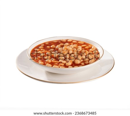 Kuru Fasulye in a white plate with decorated background. Haricot Bean is Turkish Traditional Food