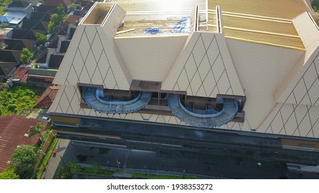 Kuta, Bali, Indonesia, March 15, 2021. Hail And Storm Damage Roof At A New Shopping Mall, Stormy Weather, Holes In Exterior Siding In Home From Damage By Hail Storm , Climate Change, Danger