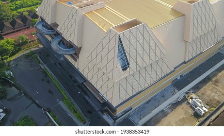 Kuta, Bali, Indonesia, March 15, 2021. Hail And Storm Damage Roof At A New Shopping Mall, Stormy Weather, Holes In Exterior Siding In Home From Damage By Hail Storm , Climate Change, Danger