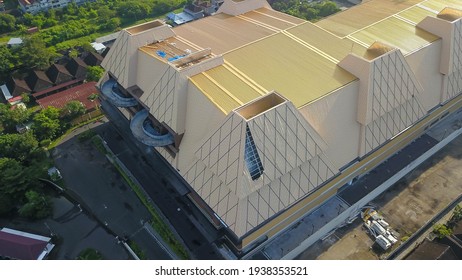 Kuta, Bali, Indonesia, March 15, 2021. Hail And Storm Damage Roof At A New Shopping Mall, Stormy Weather, Holes In Exterior Siding In Home From Damage By Hail Storm , Climate Change, Danger