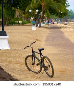 KUTA, BALI ISLAND, INDONESIA - SEPTEMBER 11, 2018: Old, Black Bicycle On Famous Kuta Beach.