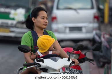 1,380 Asian family on motorbike Stock Photos, Images & Photography ...