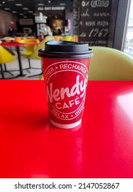 Kutaisi, Georgia - March 19, 2022: Paper Cup Of With Wendy's Logo. Cup For Tea Or Coffee.