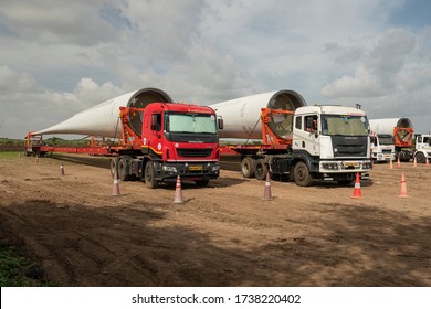 Kutch ,22 ,August ,2019 Wide angle view of parked special large trailer trucks assigned to transport Imported  wind mill blades delivery safely  at project site, Kutch, Gujarat ,India,Asia
