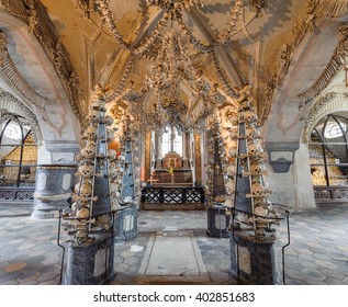 KUTNA HORA, SLOVAKIA - JULY 8, 2009: Sedlec Ossuary (aka Church of Bones) beneath the Cemetery Church of All Saints, contains over 40,000 skeletons whose bones are artistically arranged as decorations