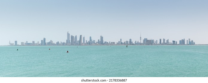 Kuwait City, Kuwait - July 7 2022: A panoramic view of Kuwait City with the Arabian Gulf in the foreground