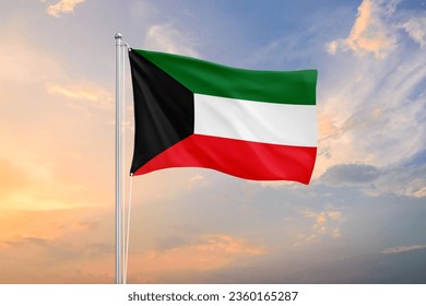 Kuwait flag waving on sundown sky