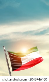 Kuwait national flag waving in beautiful clouds. - Shutterstock ID 2046746480