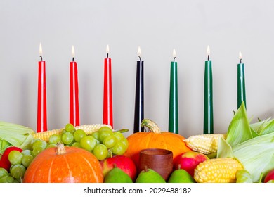 Kwanzaa Afro-American holiday. Corn, bowl and harvest. 