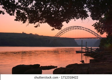 KWAZULU NATAL, SOUTH AFRICA - JUNE 15, 2018: Dusk Over The Bridge On The Mtamvuna River Bordering The Kwazulu Natal And Eastern Cape Province Wild Coast Sun Casino.